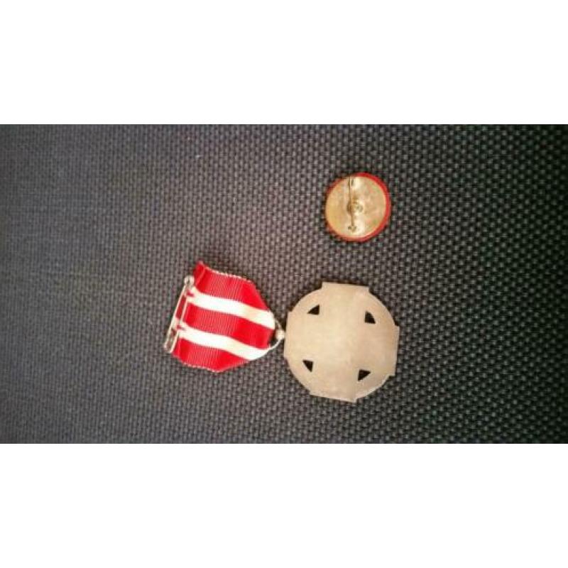 medaille en speldje