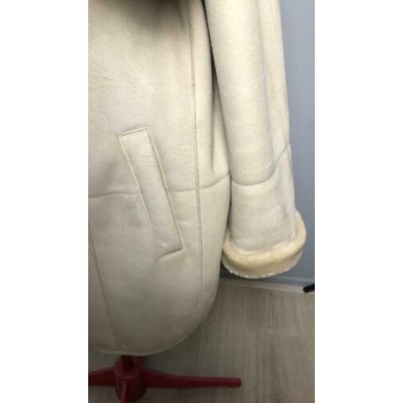Beige jas met zachte bond