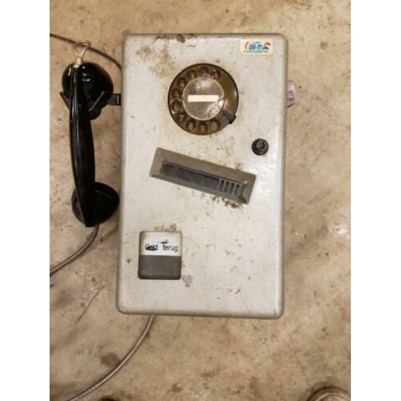 Oude kwartjes telefoon