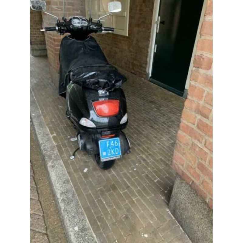 Vespa s 2013 schade met wok