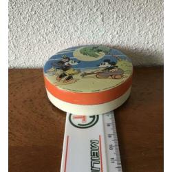 Oud, rond blikje van Mickey, en Mimi Mouse
