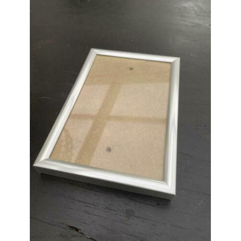 8 zilveren fotolijstjes 10x15cm. Per stuk of samen te koop.