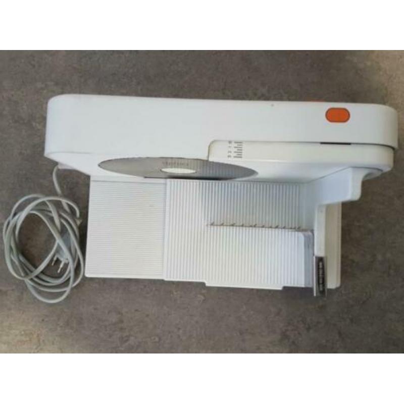 Snijmachine met verstelbare dikte