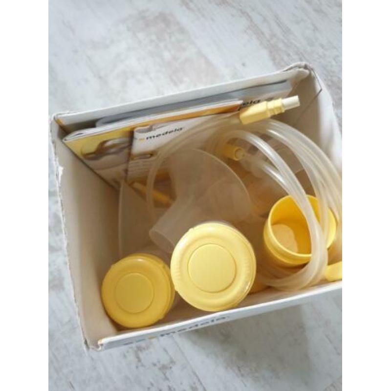 Medela Symphony - Dubbele afkolfset met Handkolf