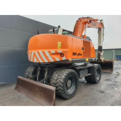 O & K NEW HOLLAND MH Plus mobiele kraan graafmachine ban