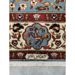 Handgeknoopt Perzisch tapijt animals blue Ghoum wol 170x240
