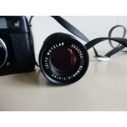 Leica CL met 40 en 90 mm Leica lenzen en Leica tas.