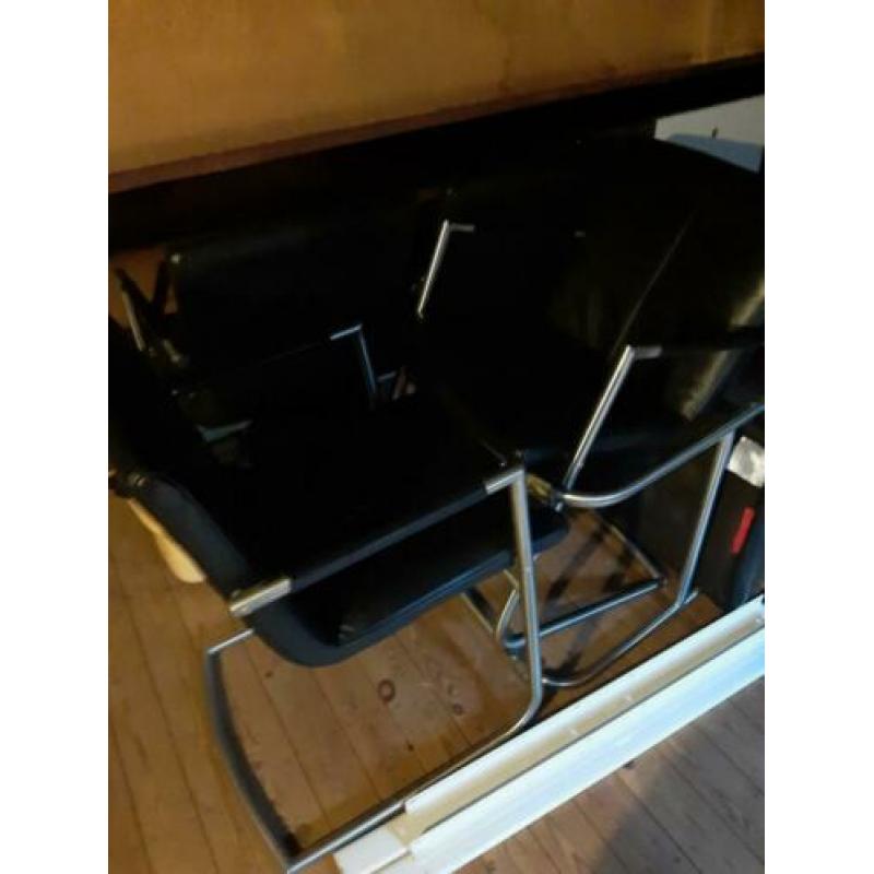 Te koop 6 stuks leren eetkamer stoelen