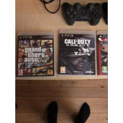 Ps3 met 4 spellen en 2 controlers