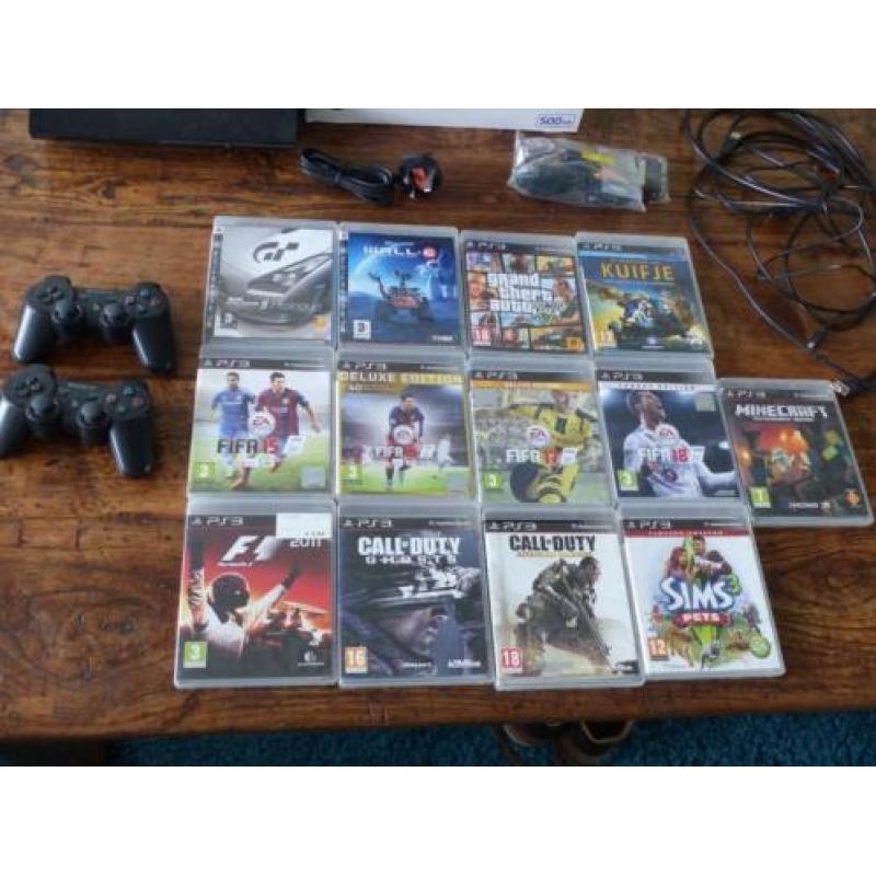 PS3 500 GB met 2 controllers en veel spellen